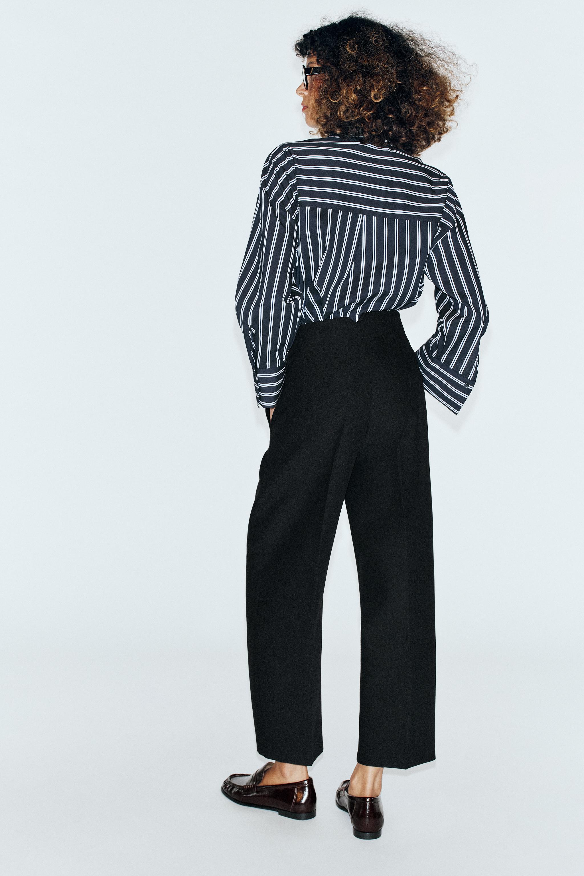 HIGH-RISE BARREL-LEG PANTS